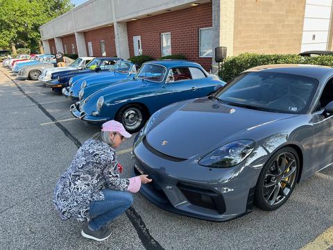 A gorgeous GT4 Cayman next to a Karmann Hardtop 356.